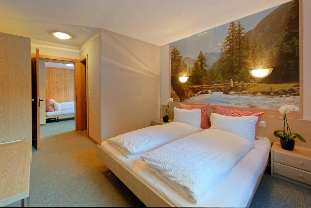 Postel nebo postele na pokoji v ubytování Hôtel Terminus