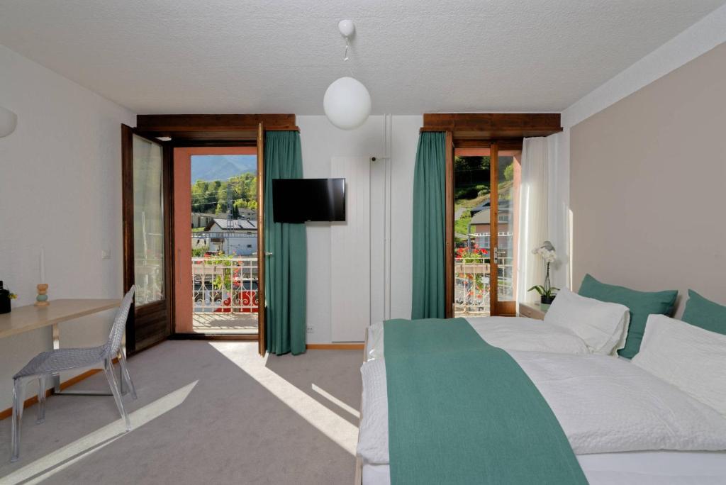 Postel nebo postele na pokoji v ubytování Hôtel Terminus