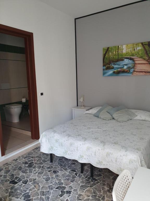 Posteľ alebo postele v izbe v ubytovaní Bed & breakfast Aurelia