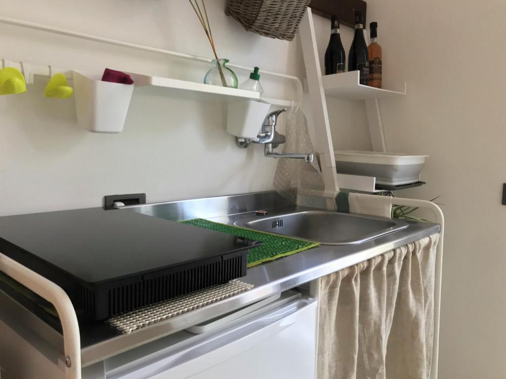 Kuchyň nebo kuchyňský kout v ubytování Green Corner Gelsomino
