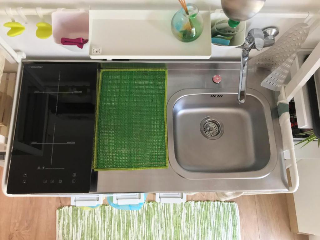Kuchyň nebo kuchyňský kout v ubytování Green Corner Gelsomino