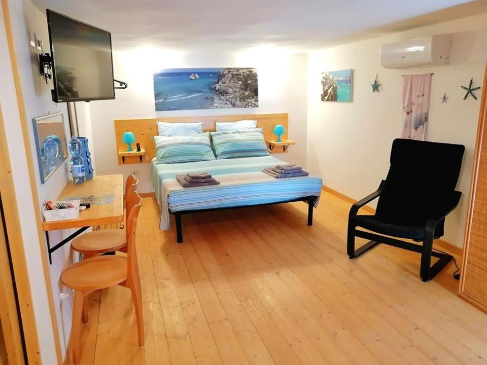 Postel nebo postele na pokoji v ubytování Elim Suite & Rooms