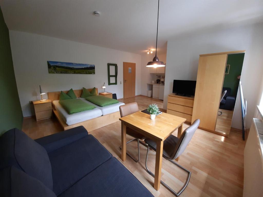 Posezení v ubytování Apartments und Bistro Zum Glasmacher