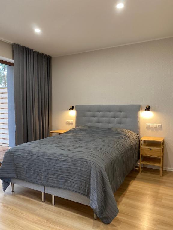 Postel nebo postele na pokoji v ubytování Valgeranna puhkekeskuse hotell
