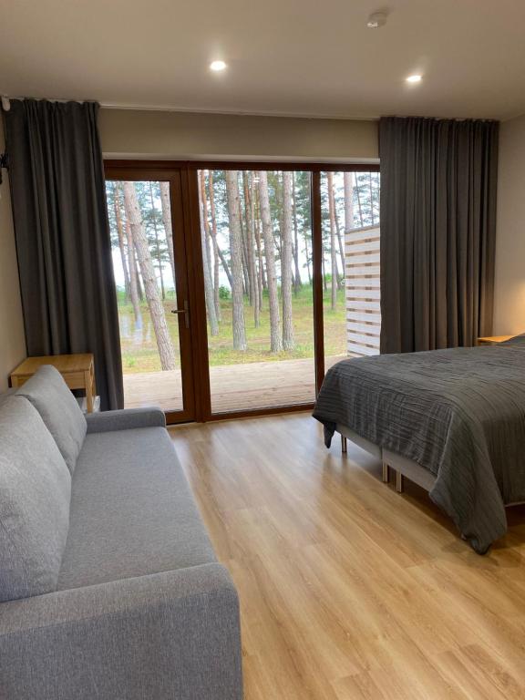 Postel nebo postele na pokoji v ubytování Valgeranna puhkekeskuse hotell