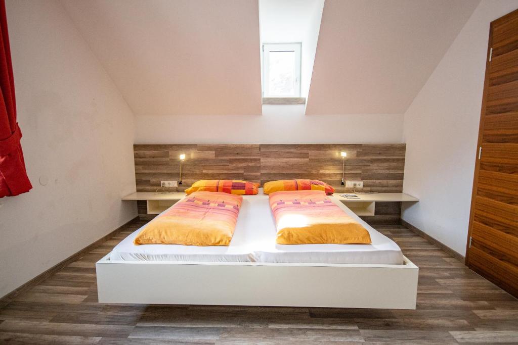 Postel nebo postele na pokoji v ubytování Gasthof Geraerhof