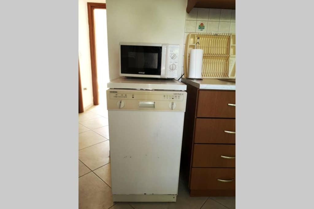 Kuchyň nebo kuchyňský kout v ubytování kallikratis apartment