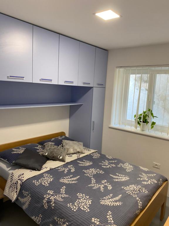 Postel nebo postele na pokoji v ubytování Apartma Sunrise Piran