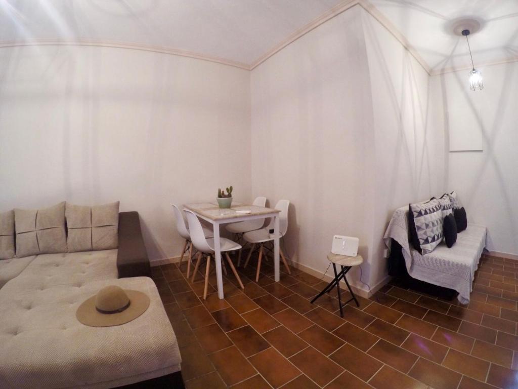 A seating area at Anemos Apartment Palio