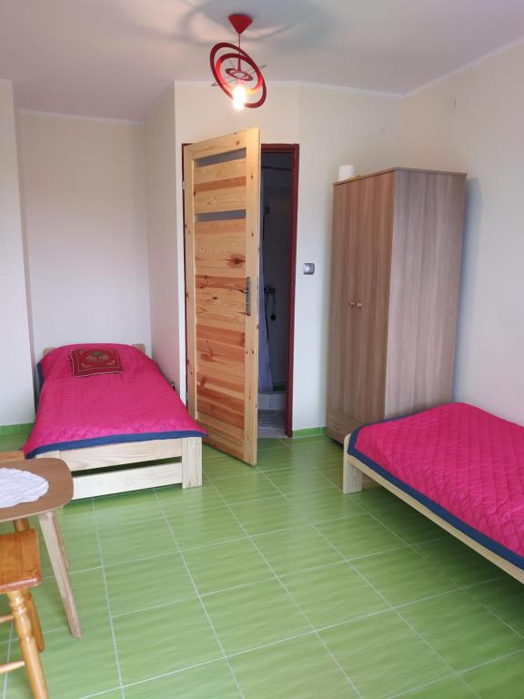Postel nebo postele na pokoji v ubytování U Babci