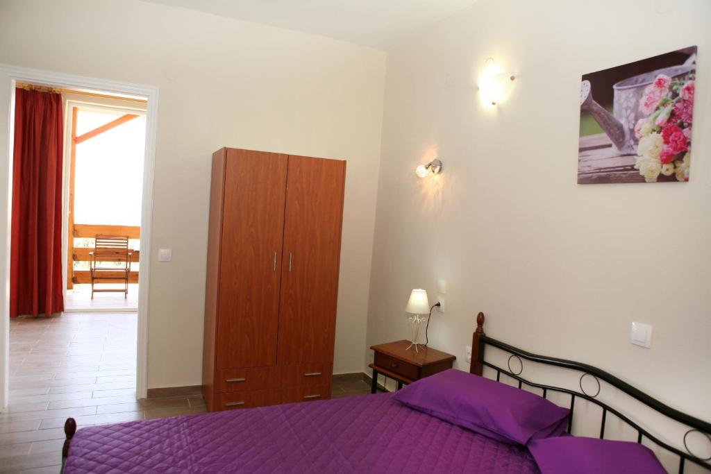 Postel nebo postele na pokoji v ubytování Villa- nefeli