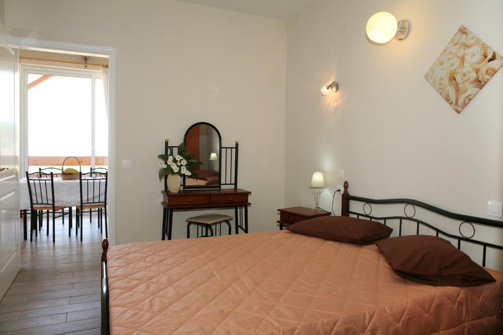 Postel nebo postele na pokoji v ubytování Villa- nefeli