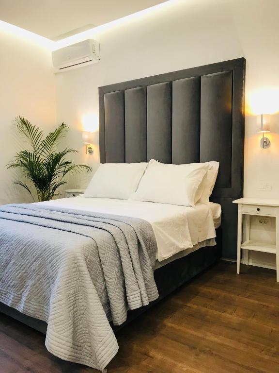 Postel nebo postele na pokoji v ubytování Antares Luxury Rooms