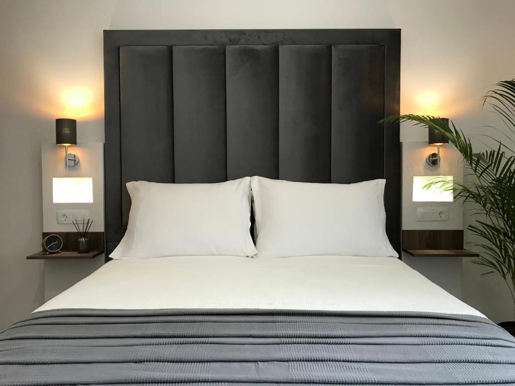 Postel nebo postele na pokoji v ubytování Antares Luxury Rooms