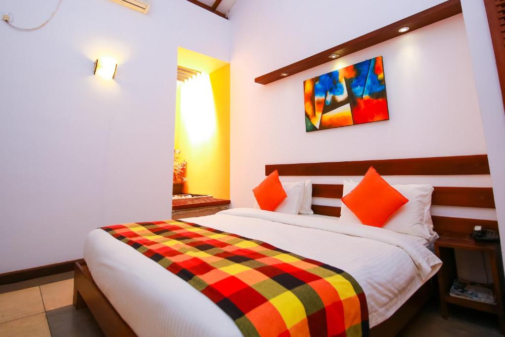 Postel nebo postele na pokoji v ubytování Hotel Alakamanda