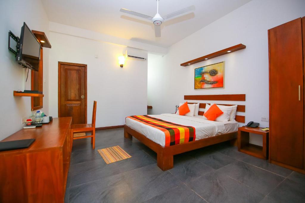 Postel nebo postele na pokoji v ubytování Hotel Alakamanda