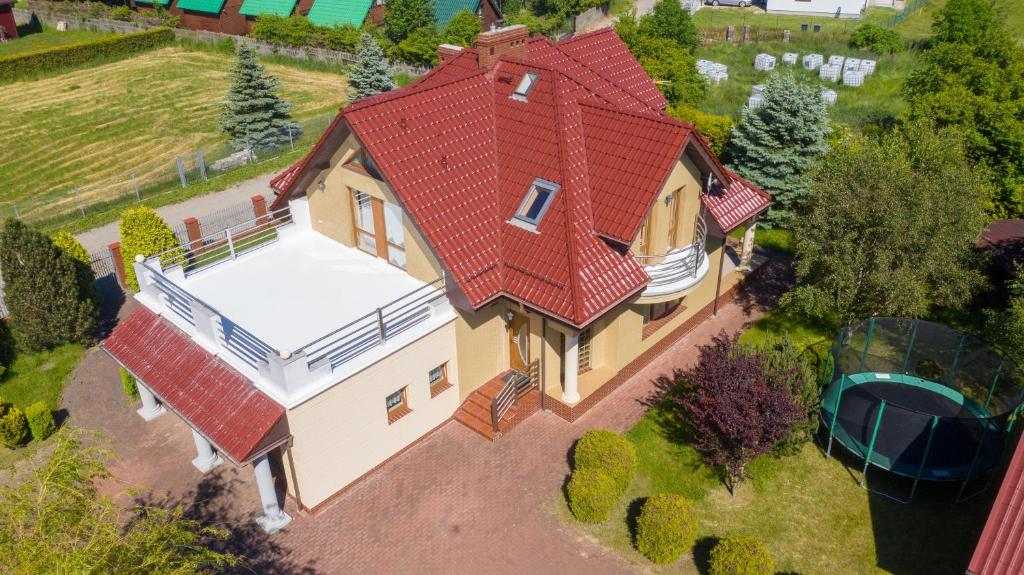 an overhead view of a house with a red roof at Willa Edi in Władysławowo