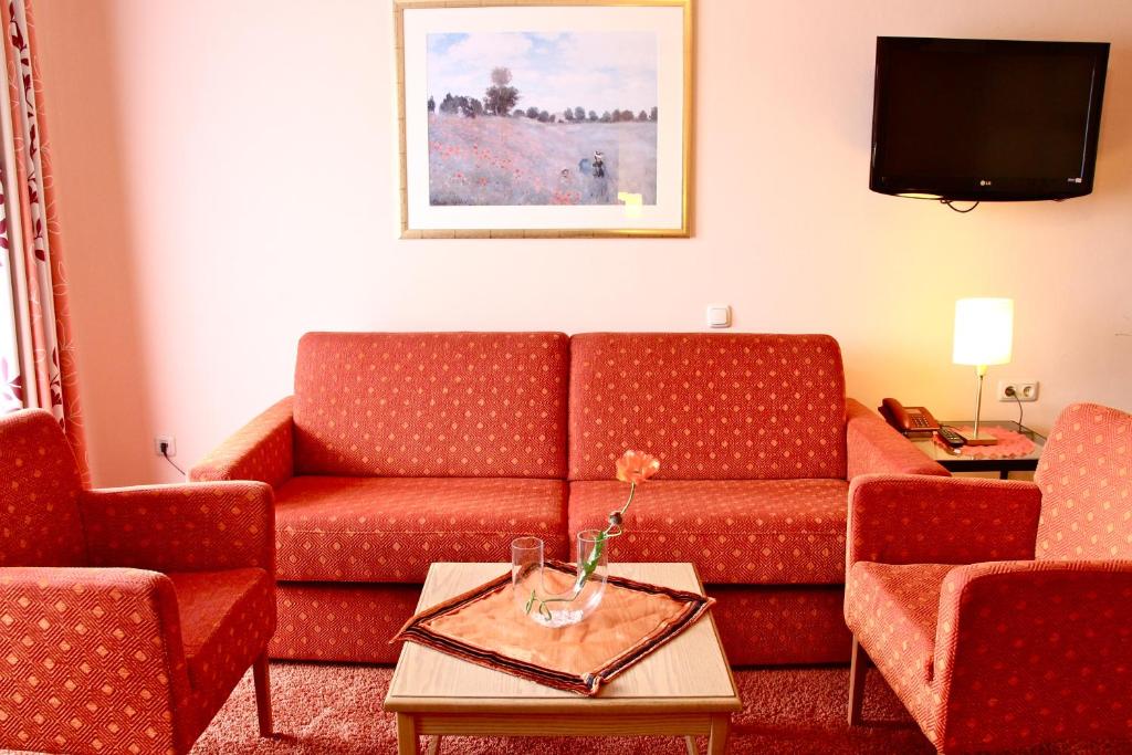 Posezení v ubytování Hotel Igelstadt