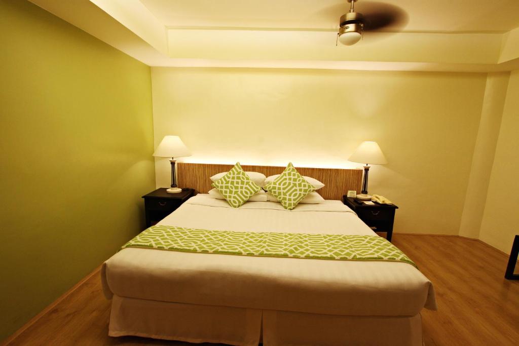 Postel nebo postele na pokoji v ubytování Hotel Fleuris