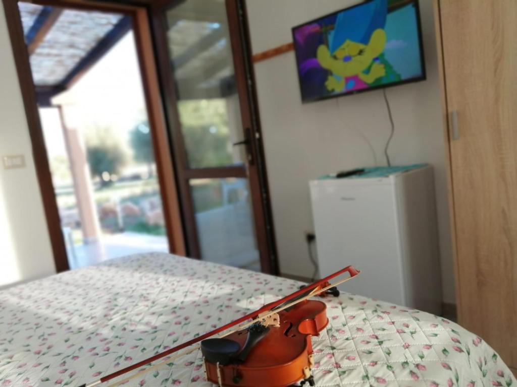 TV a/nebo společenská místnost v ubytování Istentales Alghero