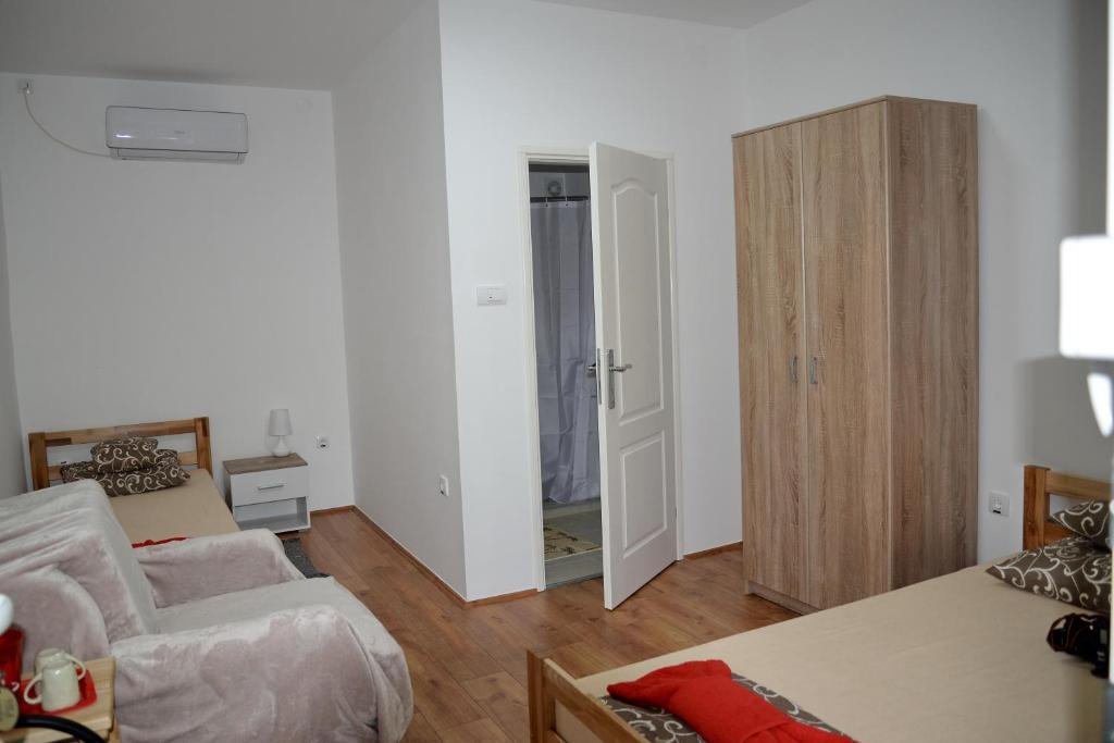Postel nebo postele na pokoji v ubytování Rooms Maša