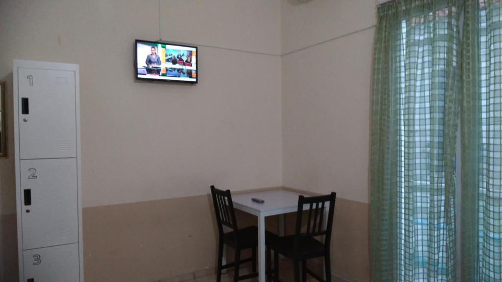TV a/nebo společenská místnost v ubytování SAN REMO HOSTEL
