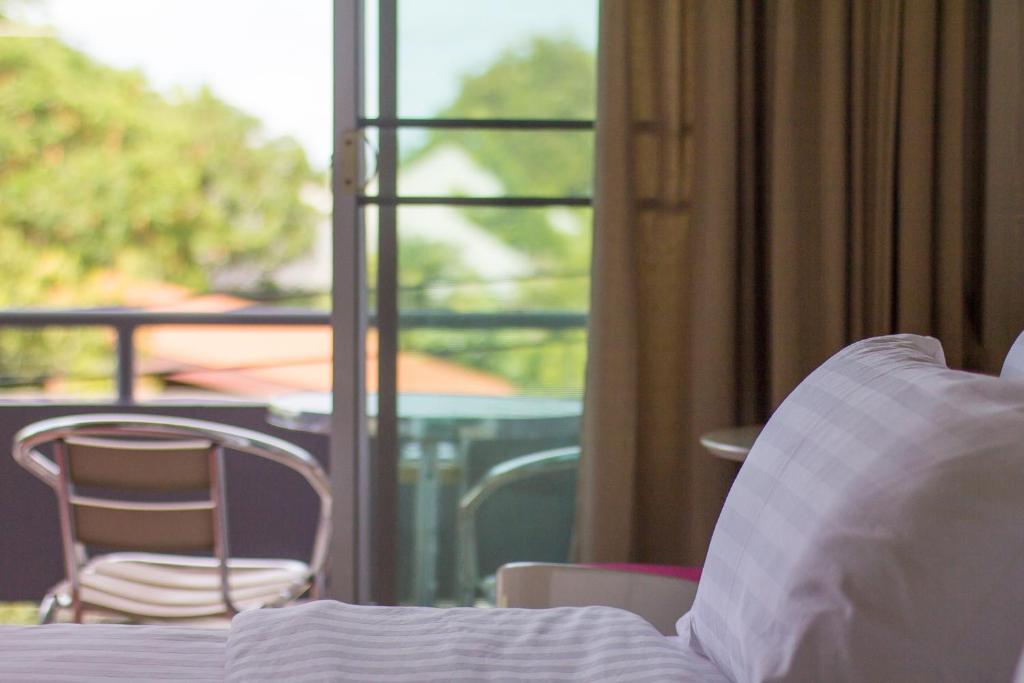 Postel nebo postele na pokoji v ubytování Maria Room HuaHin
