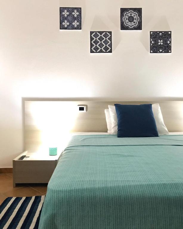 Postel nebo postele na pokoji v ubytování Villa Laregina