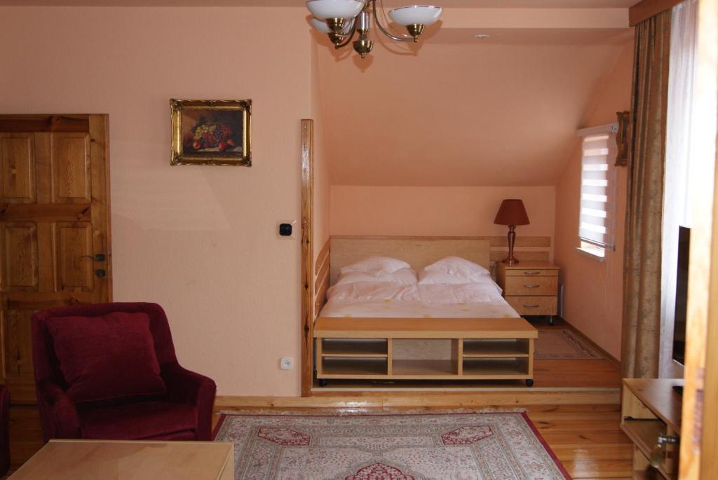 Posteľ alebo postele v izbe v ubytovaní Hotel Alga