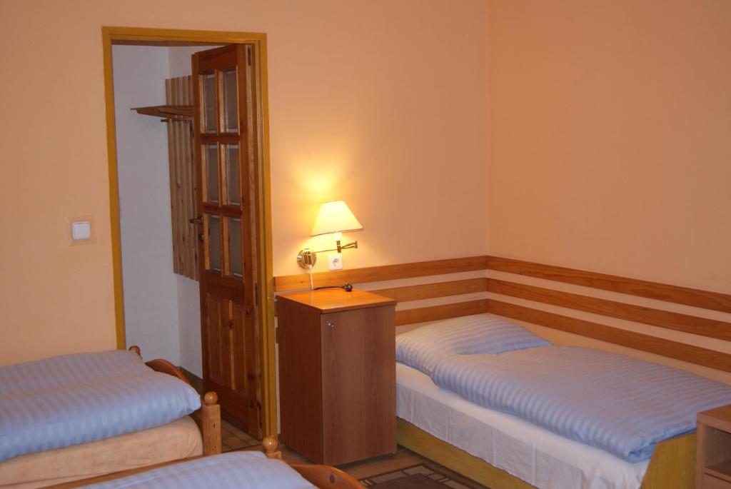 Posteľ alebo postele v izbe v ubytovaní Hotel Alga
