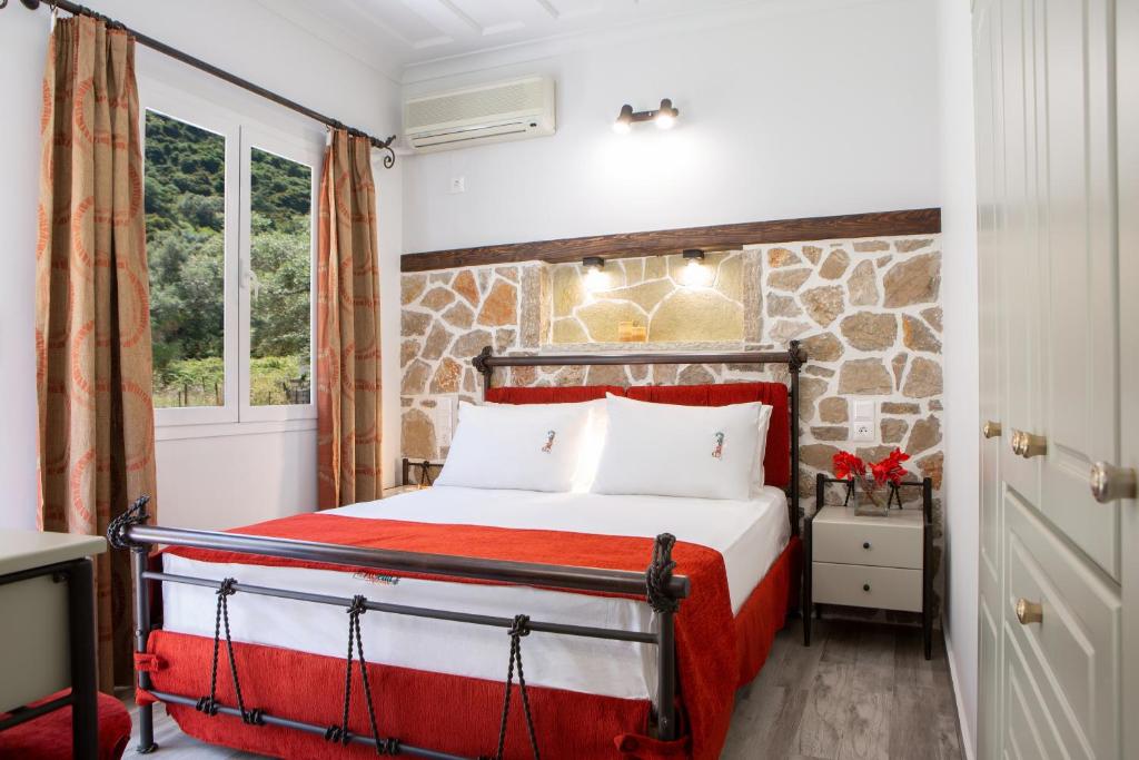 Postel nebo postele na pokoji v ubytování Villa Elia Resort