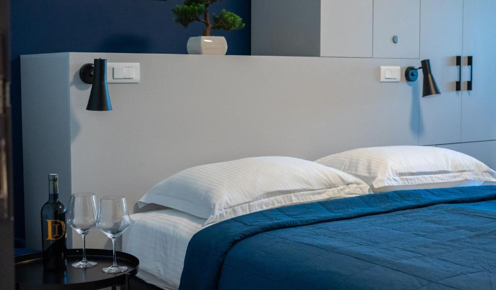 Postel nebo postele na pokoji v ubytování Hotel Blue