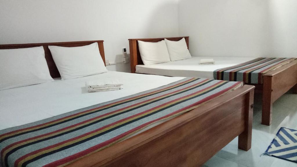 Postel nebo postele na pokoji v ubytování Umaya Holiday Home