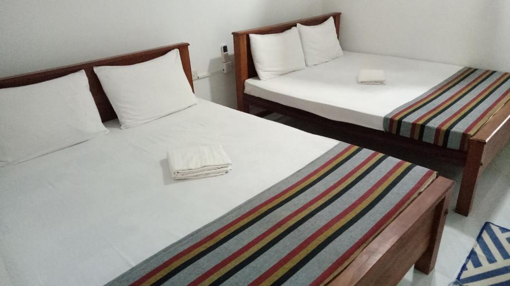 Postel nebo postele na pokoji v ubytování Umaya Holiday Home