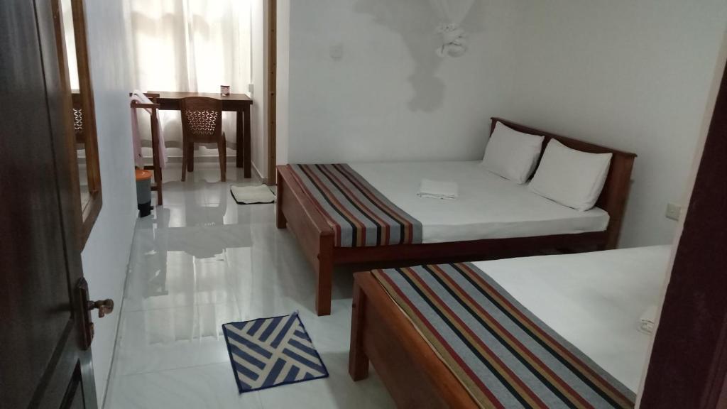 Postel nebo postele na pokoji v ubytování Umaya Holiday Home