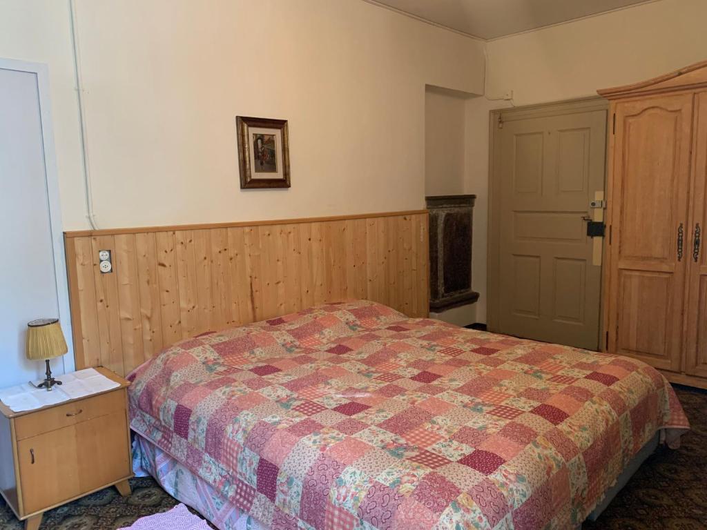 Postel nebo postele na pokoji v ubytování Albergo Calancasca Ristorante Jaipur