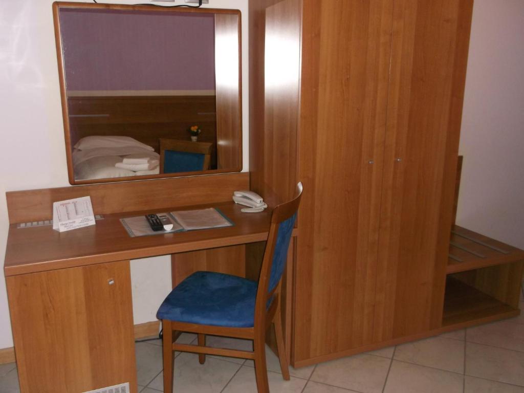Postel nebo postele na pokoji v ubytování Albergo Meublè Abatjour
