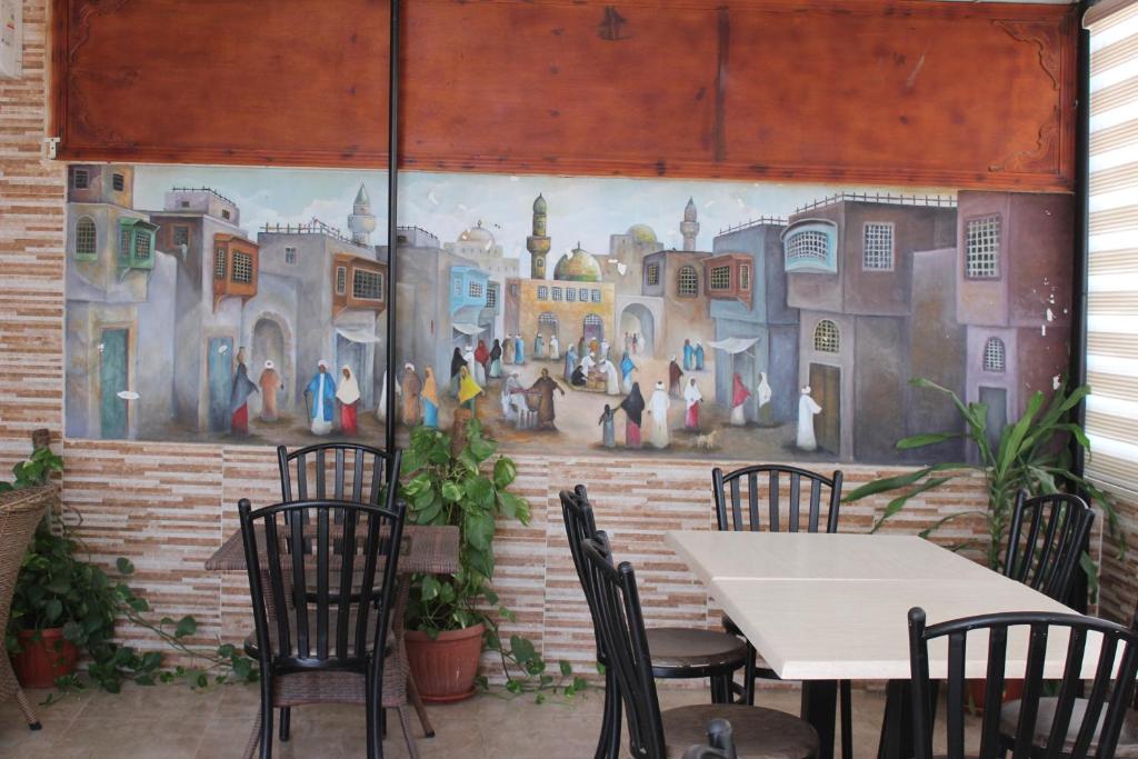Restaurant o un lloc per menjar a Amin Hotel