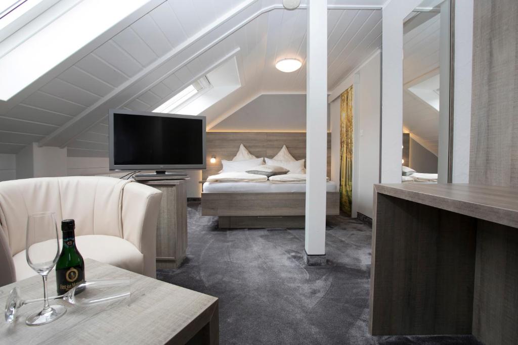 Postel nebo postele na pokoji v ubytování Hotel Forsthaus