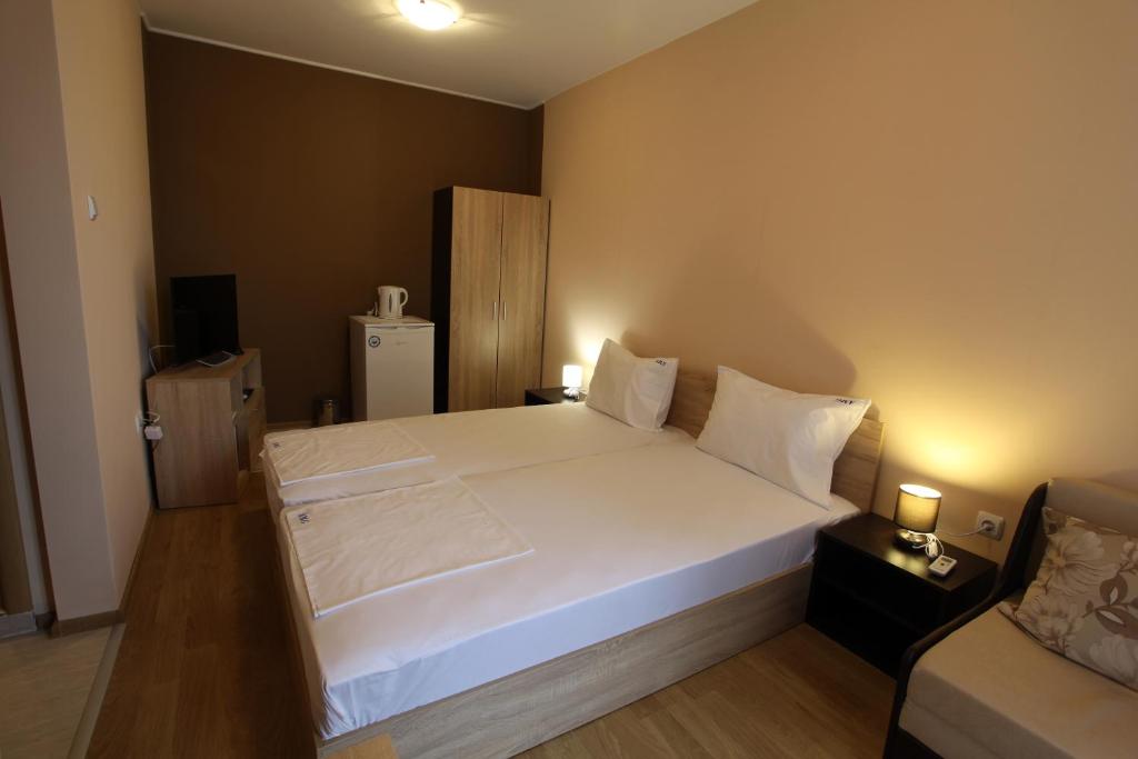 Postel nebo postele na pokoji v ubytování MESSEMBRIA RESORT