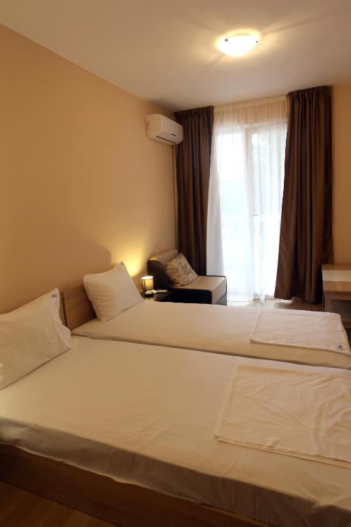 Postel nebo postele na pokoji v ubytování MESSEMBRIA RESORT