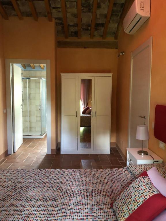 Posteľ alebo postele v izbe v ubytovaní Dolce Vita in Tuscany B&B