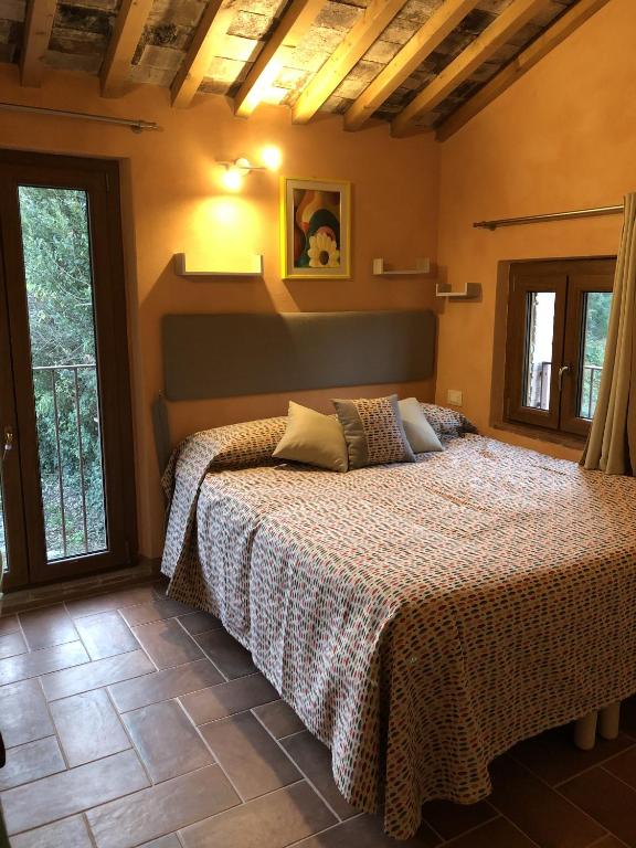 Posteľ alebo postele v izbe v ubytovaní Dolce Vita in Tuscany B&B