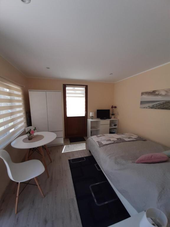 Domki i apartamenty w Ustroniu Morskim - 木屋