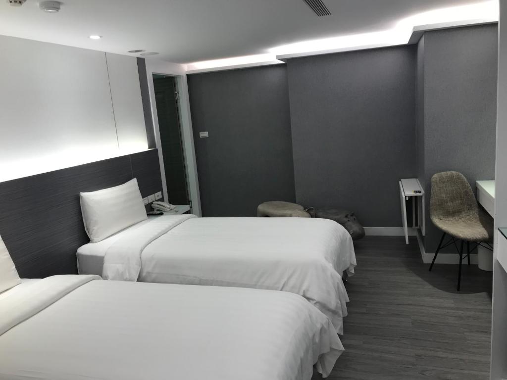 Golden Garden Hotelにあるベッド