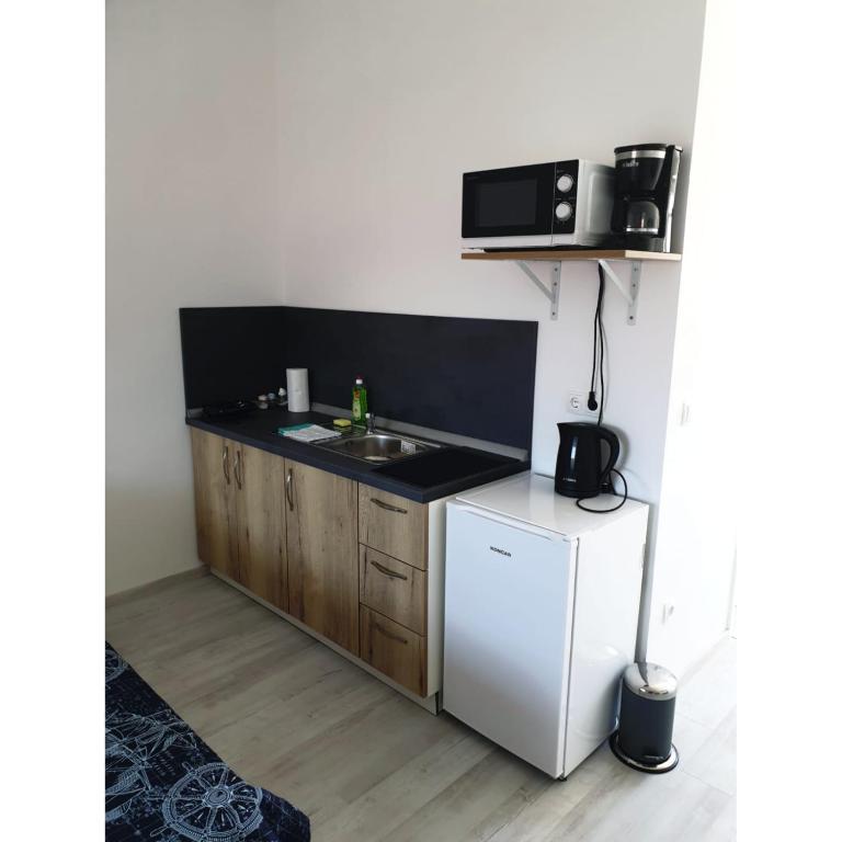 Kuchnia lub aneks kuchenny w obiekcie Apartment Mate4