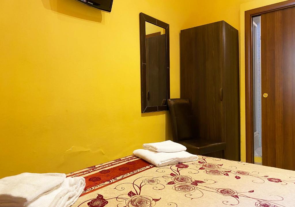 Postel nebo postele na pokoji v ubytování Sweet Dream Roma Termini