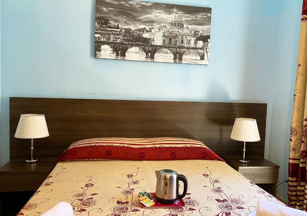 Postel nebo postele na pokoji v ubytování Sweet Dream Roma Termini
