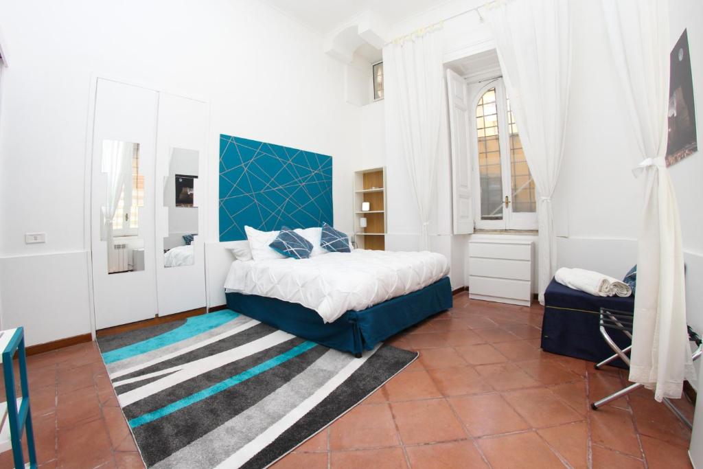 A bed or beds in a room at La Sirena a Mergellina