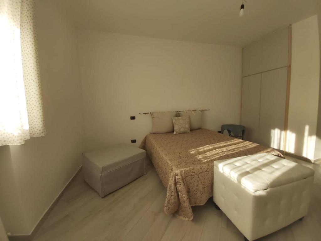 Postel nebo postele na pokoji v ubytování Casa Bruna